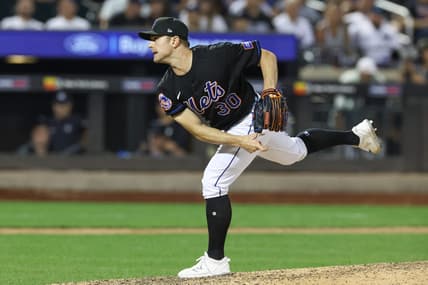 Jun 13, 2023; New York City, New York, USA; New York Mets relief pitcher David Robertson (30) delivers a pitch  during the ninth inning against the New York Yankees at Citi Field. Mandatory Credit: Vincent Carchietta-USA TODAY Sports