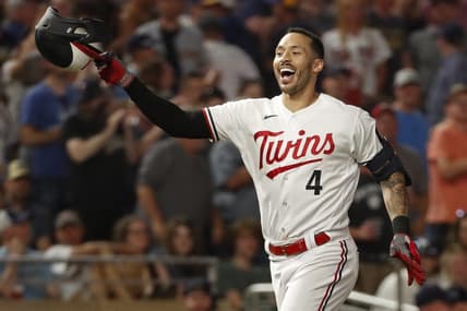 Jun 13, 2023; Minneapolis, Minnesota, USA; Minnesota Twins shortstop Carlos Correa (4) celebrates his two-run home run to beat the Milwaukee Brewers in the ninth inning at Target Field. Mandatory Credit: Bruce Kluckhohn-USA TODAY Sports