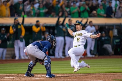 Jun 13, 2023; Oakland, California, USA; Oakland Athletics second baseman Jace Peterson (6) slides in safe against Tampa Bay Rays catcher Francisco Mejia (21) during the seventh inning at Oakland-Alameda County Coliseum. Mandatory Credit: Neville E. Guard-USA TODAY Sports