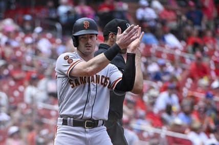 Jun 14, 2023; St. Louis, Missouri, USA;  San Francisco Giants center fielder Mike Yastrzemski (5) reacts after scoring the game winning run against the St. Louis Cardinals during the tenth inning at Busch Stadium. Mandatory Credit: Jeff Curry-USA TODAY Sports
