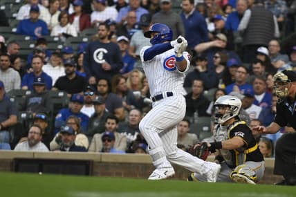 Jun 14, 2023; Chicago, Illinois, USA; Chicago Cubs right fielder Seiya Suzuki (27) singles during the first inning against the Pittsburgh Pirates at Wrigley Field. Mandatory Credit: Matt Marton-USA TODAY Sports