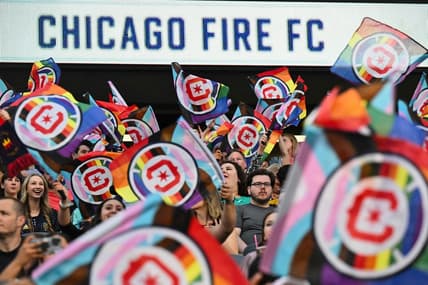 June 10, 2023; Chicago, Illinois, USA;  Fans wave Pride flags before a match between the Chicago Fire FC and the Columbus Crew SC at Soldier Field. Mandatory Credit: Jamie Sabau-USA TODAY Sports