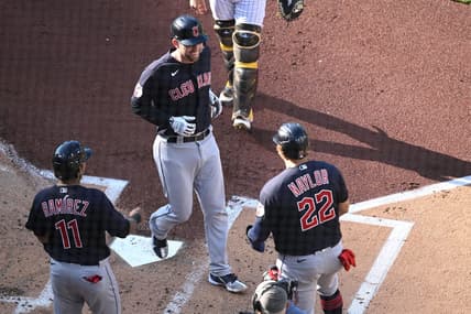 Jun 15, 2023; San Diego, California, USA; Cleveland Guardians catcher David Fry (12) is greeted at home plate after hitting a three-run home run against the San Diego Padres during the first inning at Petco Park. Mandatory Credit: Orlando Ramirez-USA TODAY Sports