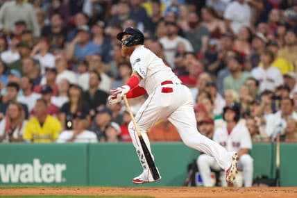 Jun 16, 2023; Boston, Massachusetts, USA; Boston Red Sox designated hitter Justin Turner (2) hits a two run home run during the second inning against the New York Yankees at Fenway Park. Mandatory Credit: Paul Rutherford-USA TODAY Sports
