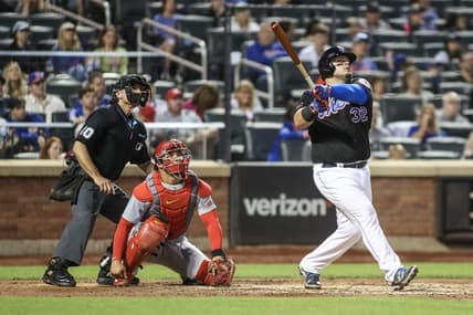 Jun 16, 2023; New York City, New York, USA; New York Mets designated hitter Daniel Vogelbach (32) hits a solo home run in the sixth inning against the St. Louis Cardinals at Citi Field. Mandatory Credit: Wendell Cruz-USA TODAY Sports