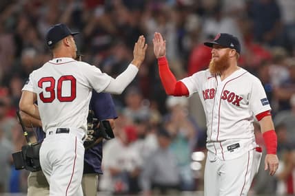 Jun 16, 2023; Boston, Massachusetts, USA; Boston Red Sox designated hitter Justin Turner (2) and Boston Red Sox left fielder Rob Refsnyder (30) celebrate after defeating the New York Yankees at Fenway Park. Mandatory Credit: Paul Rutherford-USA TODAY Sports