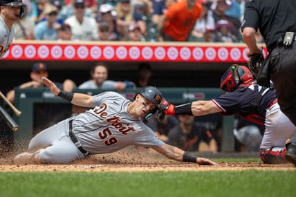 Jun 17, 2023; Minneapolis, Minnesota, USA; Detroit Tigers third baseman Zack Short (59) is tagged out at home plate by Minnesota Twins catcher Ryan Jeffers (27) during the fifth inning at Target Field. Mandatory Credit: Jesse Johnson-USA TODAY Sports