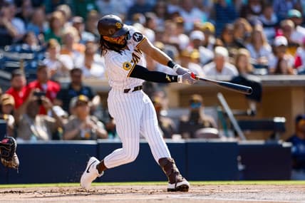 Jun 17, 2023; San Diego, California, USA;  San Diego Padres right fielder Fernando Tatis Jr. (23) hits a double in the first inning against the Tampa Bay Rays at Petco Park. Mandatory Credit: David Frerker-USA TODAY Sports