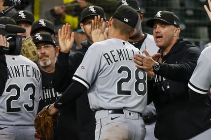 Jun 17, 2023; Seattle, Washington, USA; Chicago White Sox second baseman Zach Remillard (28) high fives manager Pedro Grifol, right, following a 4-3 victory against the Seattle Mariners in eleven innings at T-Mobile Park. Mandatory Credit: Joe Nicholson-USA TODAY Sports