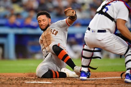 Jun 17, 2023; Los Angeles, California, USA; San Francisco Giants center fielder Luis Matos (29) scores a run against the Los Angeles Dodgers during the seventh inning at Dodger Stadium. Mandatory Credit: Gary A. Vasquez-USA TODAY Sports