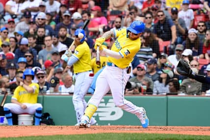 Jun 18, 2023; Boston, Massachusetts, USA; Boston Red Sox right fielder Alex Verdugo (99) hits a double against the New York Yankees during the third inning at Fenway Park. Mandatory Credit: Eric Canha-USA TODAY Sports