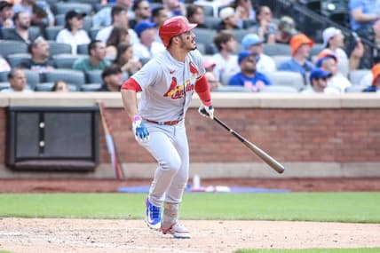 Jun 18, 2023; New York City, New York, USA;  St. Louis Cardinals third baseman Nolan Arenado (28) hits a solo hime run in the ninth inning against the New York Mets at Citi Field. Mandatory Credit: Wendell Cruz-USA TODAY Sports