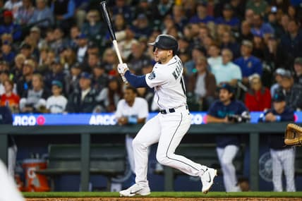 Jun 18, 2023; Seattle, Washington, USA; Seattle Mariners left fielder Jarred Kelenic (10) hits a three-run triple against the Chicago White Sox during the eighth inning at T-Mobile Park. Mandatory Credit: Joe Nicholson-USA TODAY Sports