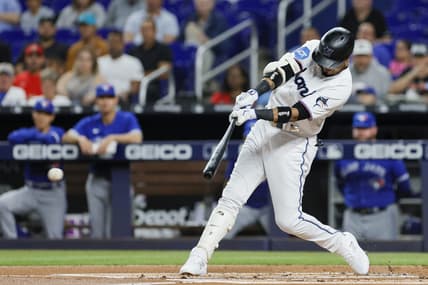 Jun 19, 2023; Miami, Florida, USA; Miami Marlins second baseman Luis Arraez (3) hits a single against the Toronto Blue Jays during the first inning at loanDepot Park. Mandatory Credit: Sam Navarro-USA TODAY Sports