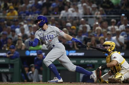 Jun 19, 2023; Pittsburgh, Pennsylvania, USA;  Chicago Cubs shortstop Dansby Swanson (7) hits an infield RBI single against the Pittsburgh Pirates during the seventh inning at PNC Park. Mandatory Credit: Charles LeClaire-USA TODAY Sports