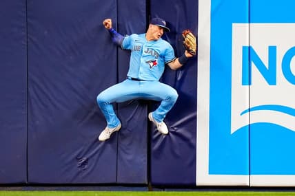 Jun 20, 2023; Miami, Florida, USA; Toronto Blue Jays left fielder Daulton Varsho (25) catches a fly ball against the Miami Marlins during the ninth inning at loanDepot Park. Mandatory Credit: Rich Storry-USA TODAY Sports