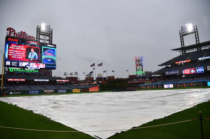 Jun 21, 2023; Philadelphia, Pennsylvania, USA; Tarp covers the infield during rain delay before start of game Philadelphia Phillies and Atlanta Braves at Citizens Bank Park. Mandatory Credit: Eric Hartline-USA TODAY Sports