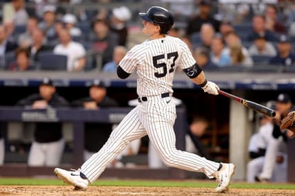 Jun 21, 2023; Bronx, New York, USA; New York Yankees left fielder Billy McKinney (57) follows through on a solo home run against the Seattle Mariners during the fourth inning at Yankee Stadium. Mandatory Credit: Brad Penner-USA TODAY Sports
