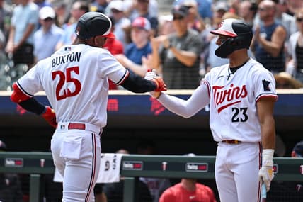 Jun 22, 2023; Minneapolis, Minnesota, USA; Minnesota Twins designated hitter Byron Buxton (25) and third baseman Royce Lewis (23) react after Buxton hit his second home run of the day during the third inning at Target Field. Mandatory Credit: Jeffrey Becker-USA TODAY Sports