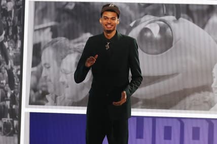 Jun 22, 2023; Brooklyn, NY, USA; Victor Wembanyama reacts after being selected first by the San Antonio Spurs in the first round of the 2023 NBA Draft at Barclays Arena. Mandatory Credit: Wendell Cruz-USA TODAY Sports