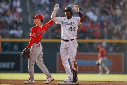Jun 23, 2023; Denver, Colorado, USA; Colorado Rockies first baseman Elehuris Montero (44) reacts from second after hitting a double in the second inning against the Los Angeles Angels at Coors Field. Mandatory Credit: Isaiah J. Downing-USA TODAY Sports