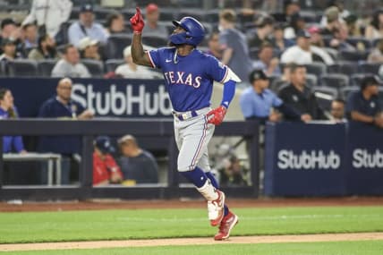 Jun 23, 2023; Bronx, New York, USA;  Texas Rangers right fielder Adolis Garcia (53) gestures after hitting a two run home run in the tenth inning against the New York Yankees at Yankee Stadium. Mandatory Credit: Wendell Cruz-USA TODAY Sports
