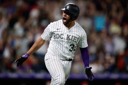 Jun 23, 2023; Denver, Colorado, USA; Colorado Rockies catcher Elias Diaz (35) reacts after hitting a grand slam in the eighth inning against the Los Angeles Angels at Coors Field. Mandatory Credit: Isaiah J. Downing-USA TODAY Sports