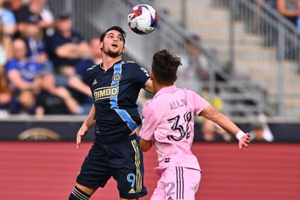 Jun 24, 2023; Philadelphia, Pennsylvania, USA; Philadelphia Union forward Julian Carranza (9) battles for the ball against Inter Miami defender Noah Allen (32) during the first half at Subaru Park. Mandatory Credit: Kyle Ross-USA TODAY Sports