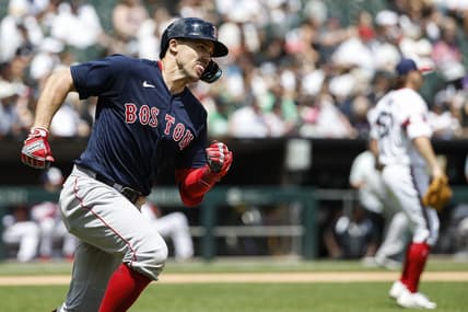 Jun 25, 2023; Chicago, Illinois, USA; Boston Red Sox center fielder Adam Duvall (18) runs after hitting an RBI-double against the Chicago White Sox during the third inning at Guaranteed Rate Field. Mandatory Credit: Kamil Krzaczynski-USA TODAY Sports