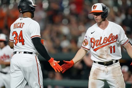 Jun 26, 2023; Baltimore, Maryland, USA; Baltimore Orioles outfielder Aaron Hicks (34) greeted by second baseman Jordan Westburg (11) after scoring a run in the sixth inning against the Cincinnati Reds at Oriole Park at Camden Yards. Mandatory Credit: Mitch Stringer-USA TODAY Sports