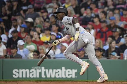 Jun 27, 2023; Boston, Massachusetts, USA; Miami Marlins center fielder Jazz Chisholm (2) hits an RBI single during the fourth inning against the Boston Red Sox at Fenway Park. Mandatory Credit: Bob DeChiara-USA TODAY Sports