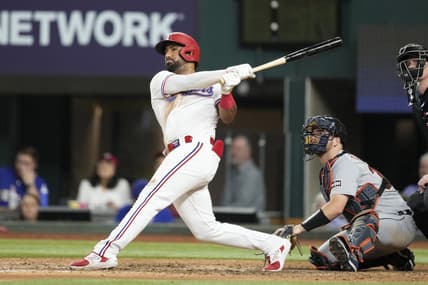 Jun 27, 2023; Arlington, Texas, USA; Texas Rangers left fielder Ezequiel Duran (20) follows through on his home run against the Detroit Tigers during the eighth inning at Globe Life Field. Mandatory Credit: Jim Cowsert-USA TODAY Sports