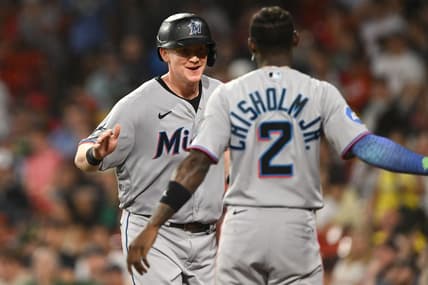 Jun 28, 2023; Boston, Massachusetts, USA; Miami Marlins first baseman Garrett Cooper (26) reacts with center fielder Jazz Chisholm Jr. (2) after scoring run against the Boston Red Sox during the sixth inning at Fenway Park. Mandatory Credit: Brian Fluharty-USA TODAY Sports