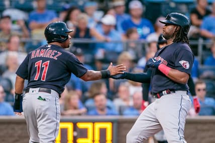Jun 28, 2023; Kansas City, Missouri, USA; Cleveland Guardians designated hitter Josh Bell (55) slaps hands with third baseman Jose Ramirez (11) after hitting a home run during the fifth inning against the Kansas City Royals at Kauffman Stadium. Mandatory Credit: William Purnell-USA TODAY Sports