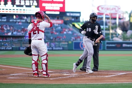 Jun 28, 2023; Anaheim, California, USA; Chicago White Sox center fielder Luis Robert Jr. (88) crosses home plate after hitting a home run in the first inning as Los Angeles Angels catcher Matt Thaiss (21) watches at Angel Stadium. Mandatory Credit: Kirby Lee-USA TODAY Sports