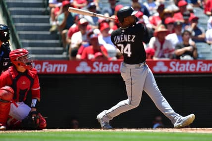Jun 29, 2023; Anaheim, California, USA; Chicago White Sox right fielder Eloy Jimenez (74) hits a two run RBI single against the Los Angeles Angels during the third inning at Angel Stadium. Mandatory Credit: Gary A. Vasquez-USA TODAY Sports