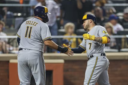 Jun 29, 2023; New York City, New York, USA; Milwaukee Brewers catcher Victor Caratini (7) slaps hands with first baseman Rowdy Tellez (11) after his two run home run against the New York Mets during the sixth inning at Citi Field. Mandatory Credit: Vincent Carchietta-USA TODAY Sports
