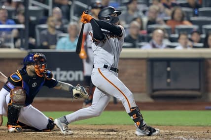 Jun 30, 2023; New York City, New York, USA; San Francisco Giants catcher Patrick Bailey (14) follows through on a three run home run against the New York Mets during the eighth inning at Citi Field. Mandatory Credit: Brad Penner-USA TODAY Sports