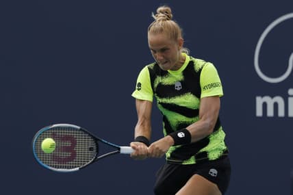Mar 22, 2022; Miami Gardens, FL, USA; Arantxa Rus of Netherlands hits a backhand against Heather Watson of Great Britain (not pictured) in a first round women's singles match in the Miami Open at Hard Rock Stadium. Mandatory Credit: Geoff Burke-USA TODAY Sports