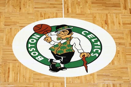 Apr 3, 2022; Boston, Massachusetts, USA; The Boston Celtics logo is seen on the parquet floor at center court before the game between the Boston Celtics and the Washington Wizards at TD Garden. Mandatory Credit: Winslow Townson-USA TODAY Sports