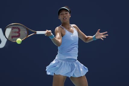 Mar 27, 2023; Miami, Florida, US; Qinwen Zheng (CHN) serves against Anastasia Potapova (not pictured) on day eight of the Miami Open at Hard Rock Stadium. Mandatory Credit: Geoff Burke-USA TODAY Sports