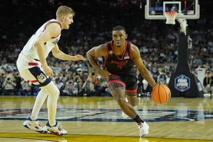 Apr 3, 2023; Houston, TX, USA; San Diego State Aztecs guard Lamont Butler (5) dribbles the ball against Connecticut Huskies guard Joey Calcaterra (3) in the national championship game of the 2023 NCAA Tournament at NRG Stadium. Mandatory Credit: Bob Donnan-USA TODAY Sports