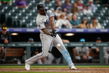 May 25, 2023; Denver, Colorado, USA; Miami Marlins designated hitter Jorge Soler (12) hits a two run home run in the ninth inning against the Colorado Rockies at Coors Field. Mandatory Credit: Isaiah J. Downing-USA TODAY Sports