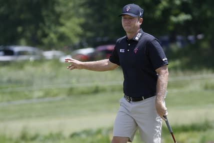 May 25, 2023; Washington, DC, USA; Talor Gooch waves to fans after making a putt on the second hole during the first round of the LIV Golf DC 2023 tournament at Trump National Golf Club in Sterling, Va. Mandatory Credit: Geoff Burke-USA TODAY Sports