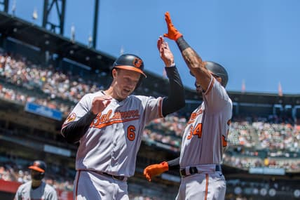 Jun 4, 2023; San Francisco, California, USA; Baltimore Orioles first baseman Ryan Mountcastle (6) is congratulated by center fielder Aaron Hicks (34) after he scored against the San Francisco Giants during the third inning at Oracle Park. Mandatory Credit: John Hefti-USA TODAY Sports