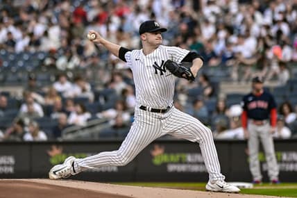Jun 11, 2023; Bronx, New York, USA; New York Yankees starting pitcher Clarke Schmidt (36) pitches against the Boston Red Sox during the first inning at Yankee Stadium. Mandatory Credit: John Jones-USA TODAY Sports