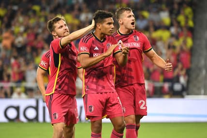 Jun 17, 2023; Nashville, Tennessee, USA; St. Louis City forward Nicholas Gioacchini (11) celebrates with teammates after scoring a goal against Nashville SC during the first half at Geodis Park. Mandatory Credit: Christopher Hanewinckel-USA TODAY Sports