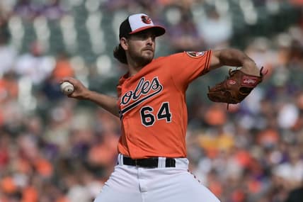 Jun 24, 2023; Baltimore, Maryland, USA;  Baltimore Orioles starting pitcher Dean Kremer (64) throws a second inning pitch against the Seattle Mariners at Oriole Park at Camden Yards. Mandatory Credit: Tommy Gilligan-USA TODAY Sports