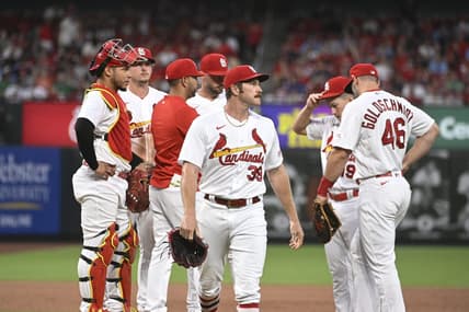 Jun 28, 2023; St. Louis, Missouri, USA; St. Louis Cardinals starting pitcher Miles Mikolas (39) walks off the field after being pulled by St. Louis Cardinals manager Oliver Marmol (37) in the sixth inning against the Houston Astros at Busch Stadium. Mandatory Credit: Joe Puetz-USA TODAY Sports