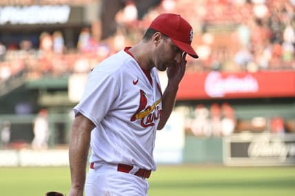 Jun 29, 2023; St. Louis, Missouri, USA; St. Louis Cardinals starting pitcher Adam Wainwright (50) reacts while walking off the field after being pulled by St. Louis Cardinals manager Oliver Marmol (37) (not pictured) against the Houston Astros in the second inning at Busch Stadium. Mandatory Credit: Joe Puetz-USA TODAY Sports